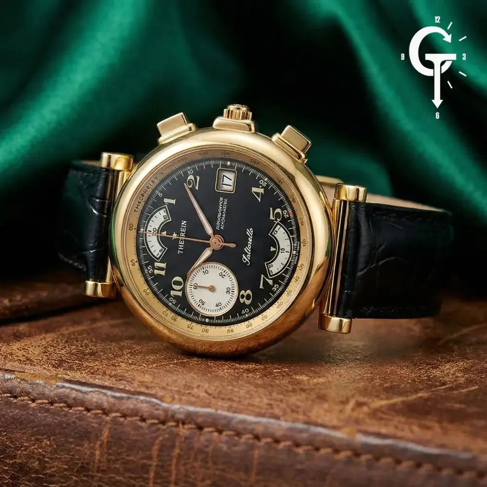 Theorein Saltarello Cronografo Oro 18k Ref. 166 167 con quadrante nero e cinturino in pelle nera, disponibile su GT Orologerie. Orologio vintage revisionato con ore saltanti.